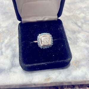 Italian Hand made 1/12ct paved dimond, blue dimond around